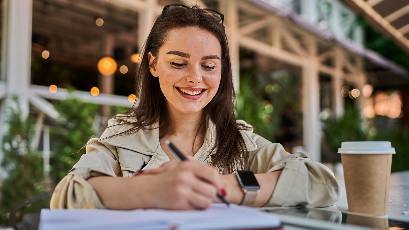 woman-makes-notes-her-notebook-street